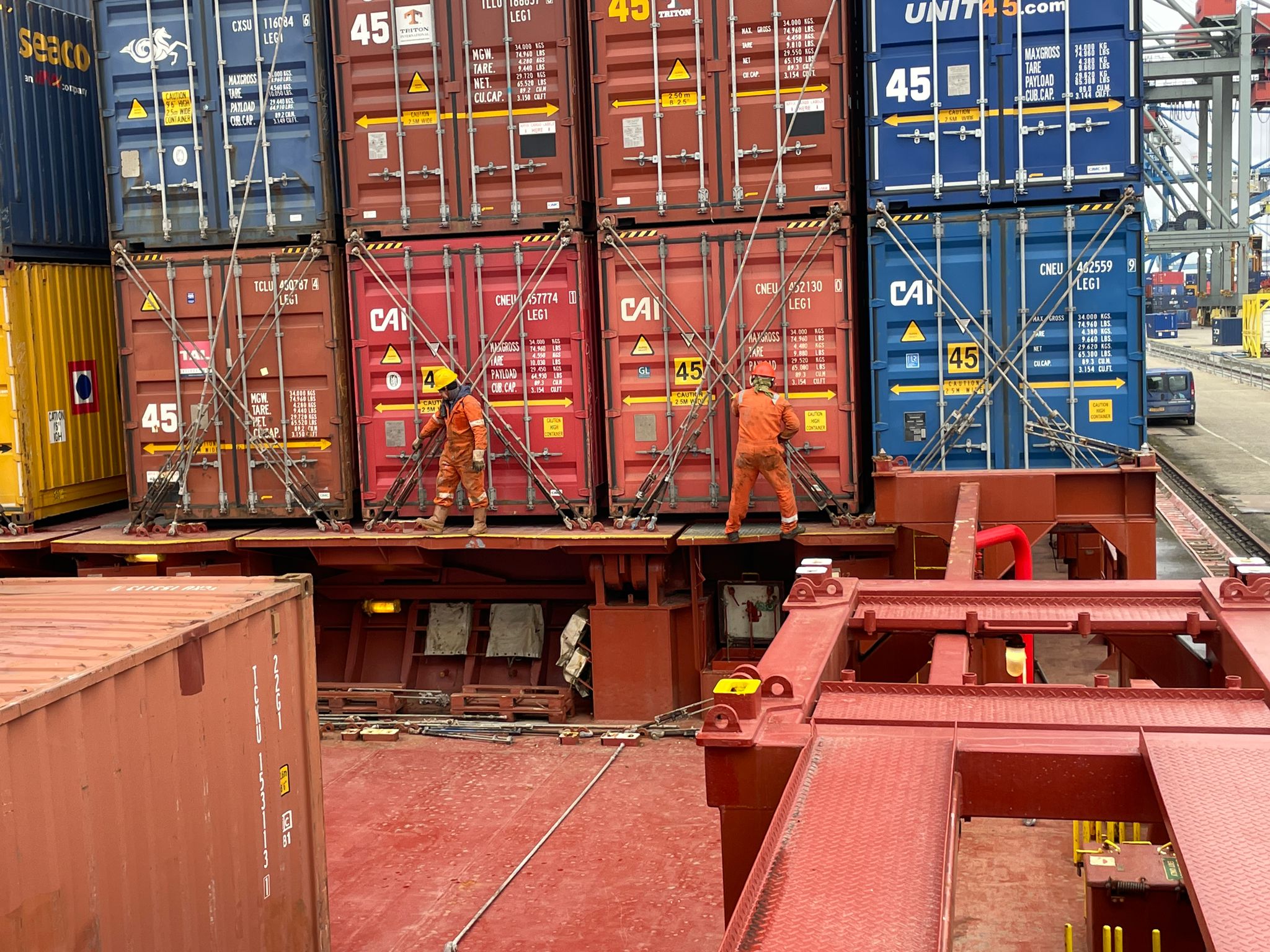 Risky business: a seafarer undertakes lashing in Rotterdam