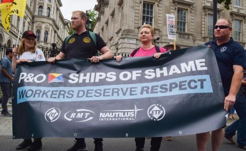 ITF banner &quot;ships of shame&quot; being carried at a protest